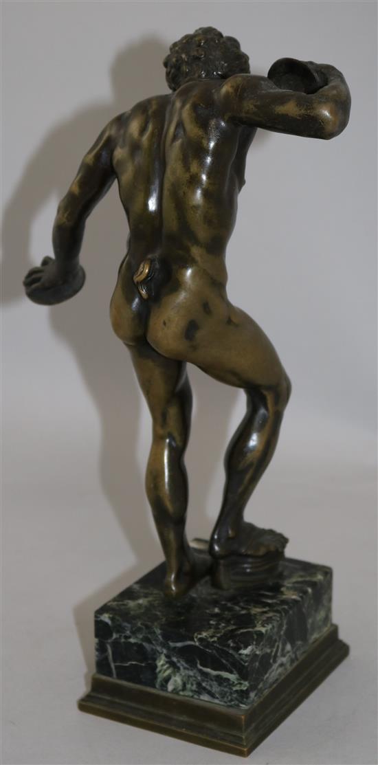 After the Antique. A 19th century bronze figure of a dancing faun, 12.75in.